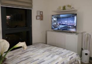 Condo in South Triangle - Your Cozy Urban Retreat Apartment in Quezon City