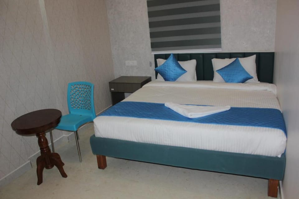 SHR Comfort Near Reva Circle Hotel in Bengaluru