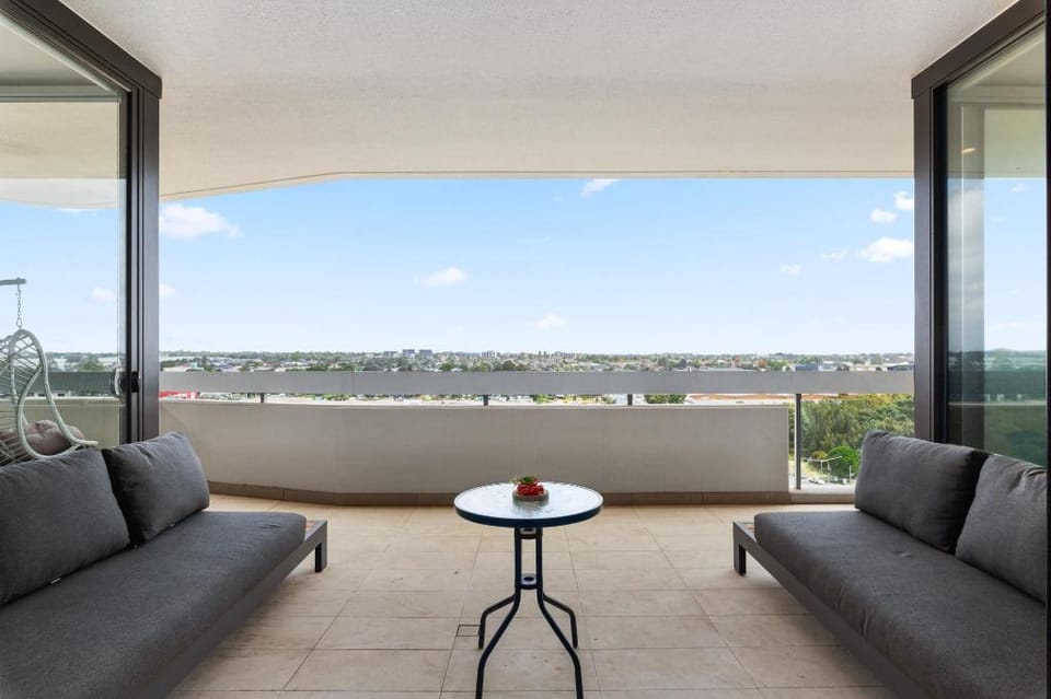 Luxe 2-Bed: Modern Interiors, Balcony & BBQ Area Apartment in Lidcombe