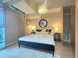 Elegant Central 1BR BGC 11P Uptown Parksuites T2 Vacation rental in Makati