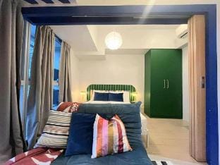 Cozy Cute 1BR BGC T2 Uptown Parksuites Vacation rental in Makati