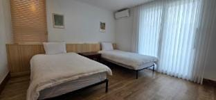 B.  B102호 25평 서귀포 중문 해누리펜션(방2,화장실2, 침대4) Vacation rental in South Korea