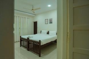 4 bedroom Pool Villa in Thodupuzha- Heliconia Inn Vacation rental in Kerala