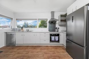 Sunny Coastal 4BR Escape. Walk to St Heliers Beach Vacation rental in Auckland