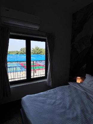 Cozy Retreat with Pool, Gym & Pickleball Vacation rental in Tamil Nadu