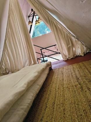 Rustic Palms A shaped cabins Vacation rental in Alibag