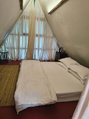 Rustic Palms A shaped cabins Vacation rental in Alibag