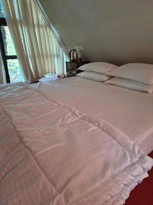 Rustic Palms A shaped cabins Vacation rental in Alibag