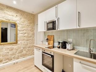 Charming Apartment Center of Paris by Studio Prestige Apartment in Paris
