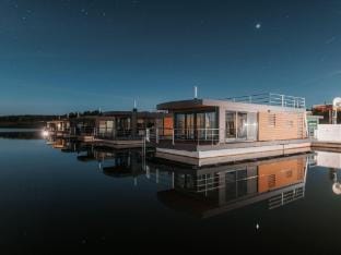 Two-bedroom holiday home, Klitten Docked boat in Saxony