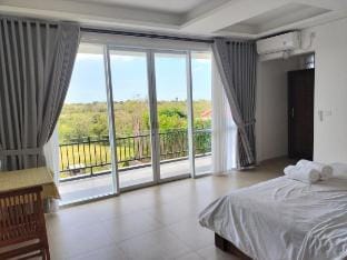 Cozy sunrise villa Room 6 private balcony  Vacation rental in Bali