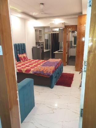Nimbus homestay Studio apt at DLF capital greens Vacation rental in Delhi