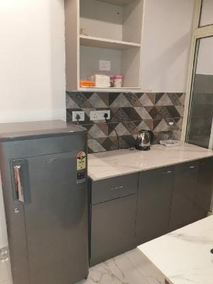 Nimbus homestay Studio apt at DLF capital greens Vacation rental in Delhi