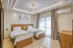 Spacious Sheikh Zayed Hotel Apt• Pool/Gym access Apartment in Egypt