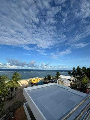 Beachfront Haven • Balcony + Rooftop Panorama Vacation rental in Siargao Island