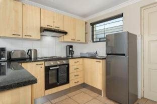 Planet Africa Studio | Pool | Gym Apartment in Sea Point