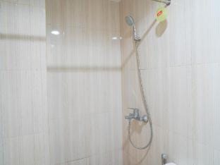 White Compact 1BR at Sentul Tower By Travelio Apartment in West Java