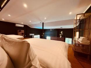 Khaolak LOFT Suite A with 2 King size beds 1 bathroom at Kokotel Montana Hotel Apartment in Khuekkhak