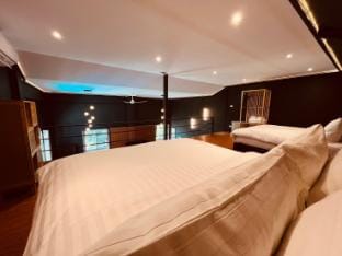 Khaolak LOFT Suite A with 2 King size beds 1 bathroom at Kokotel Montana Hotel Apartment in Khuekkhak
