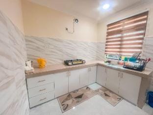 Flora Rozel Homestay | Ground Floor Vacation rental in Terengganu, Malaysia
