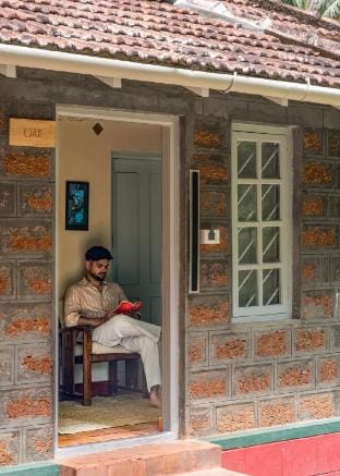 Timber Cottage by Raho: Stream-View Estate Escape Vacation rental in Karnataka