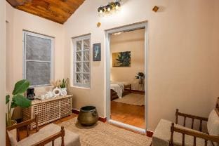 Timber Cottage by Raho: Stream-View Estate Escape Vacation rental in Karnataka
