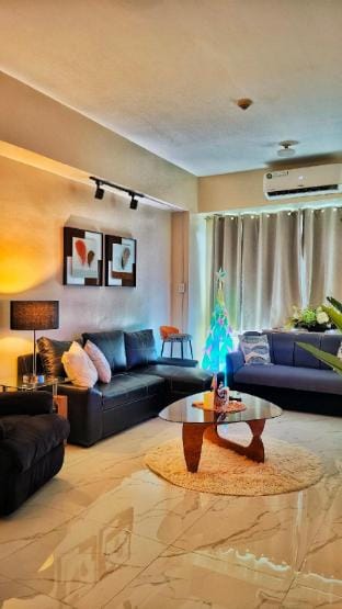 Luxurious Heights Connected to Eastwood Mall 75"TV Vacation rental in Pasig