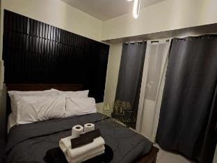 Wake to Sunrise at McQueen Suites 1BR Brenthill Vacation rental in Baguio