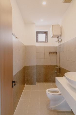 The room has a view of the house and pine hill Vacation rental in Dalat