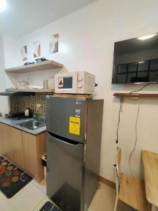 Cozy 1br Topmost floor mall view with Netflix Vacation rental in Las Pinas