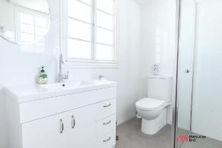 MetaWiseBnB | Waterfront 3BR Coastal Escape Vacation rental in Deception Bay