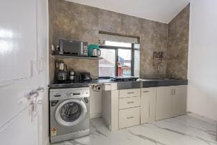 Modern 1BHK Condo | W/S. Pool | 3m. Walk To Beach Apartment in Goa, India