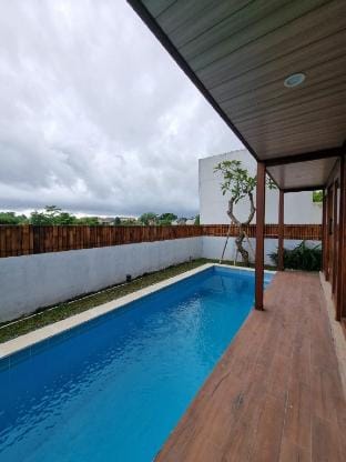 Serene Wooden Retreat with Stunning 25-Meter Pool Vacation rental in North Kuta