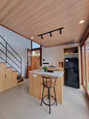Serene Wooden Retreat with Stunning 25-Meter Pool Vacation rental in North Kuta