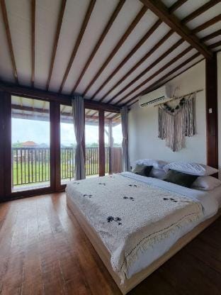 Serene Wooden Retreat with Stunning 25-Meter Pool Vacation rental in North Kuta