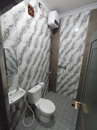 Tirta suci guest house Vacation rental in Kuta