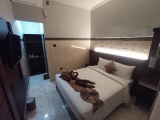 Tirta suci guest house Vacation rental in Kuta