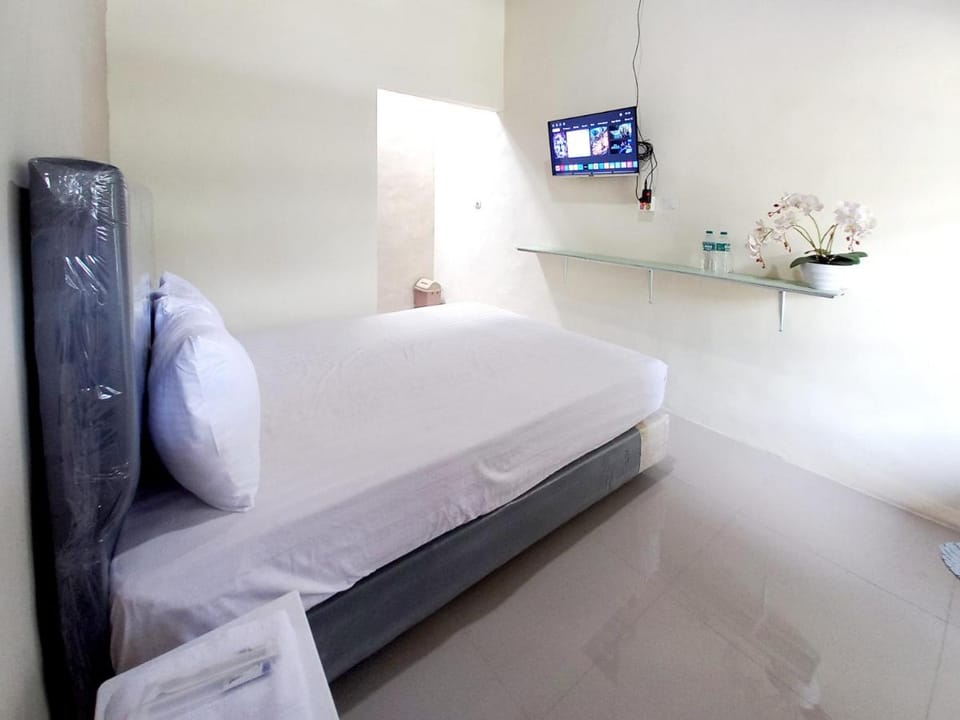 MM Homey Syariah near Taman Gajah Bolong Baureno RedPartner Hotel in East Java