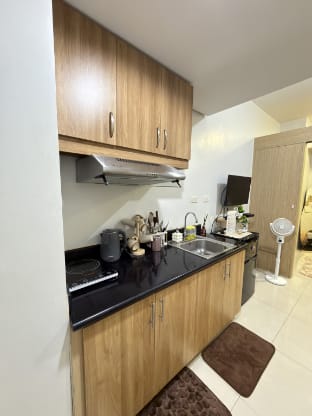 Rest Coast Escape at Tower 4 Grass Residences Apartment in Quezon City