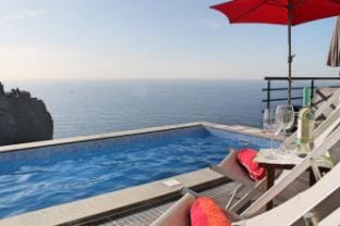 Perched above village, ocean views | Jardim Mar Villa in Madeira District