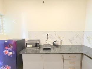 1BHK Abode in a Villa w/ Terrace - Perfect for Two Vacation rental in Bengaluru