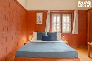 StayVista at Woods & Bricks Cottage Villa in Bengaluru