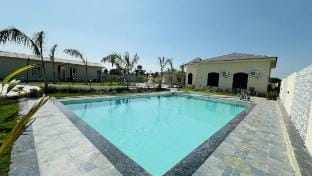 BLUE SKY FARMS  Farm Stay in Jaipur