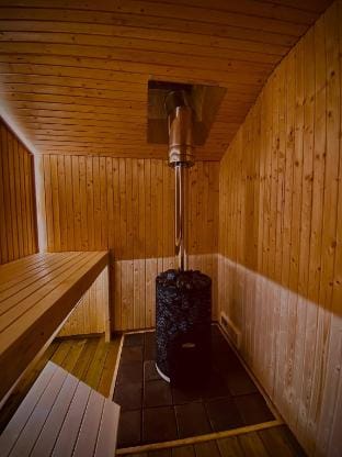 Nice cozy cottage with fireplace, barbecue hut and wood sauna Vacation rental in Sweden