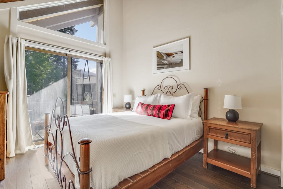 Bedroom 2 features a queen bed and a private balcony for your me time.