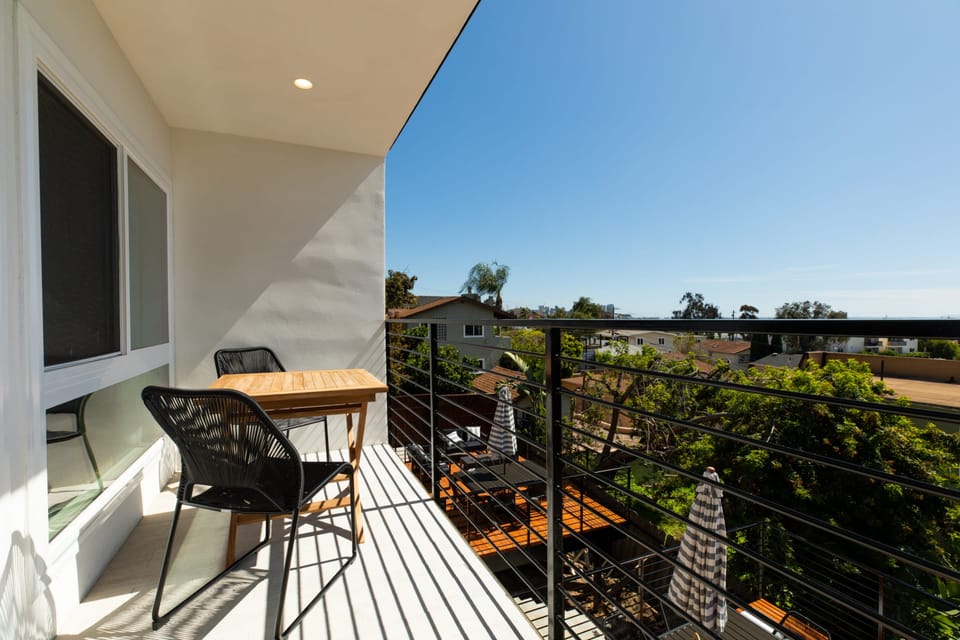 Unit 4 (upstairs) - Balcony access from living room.