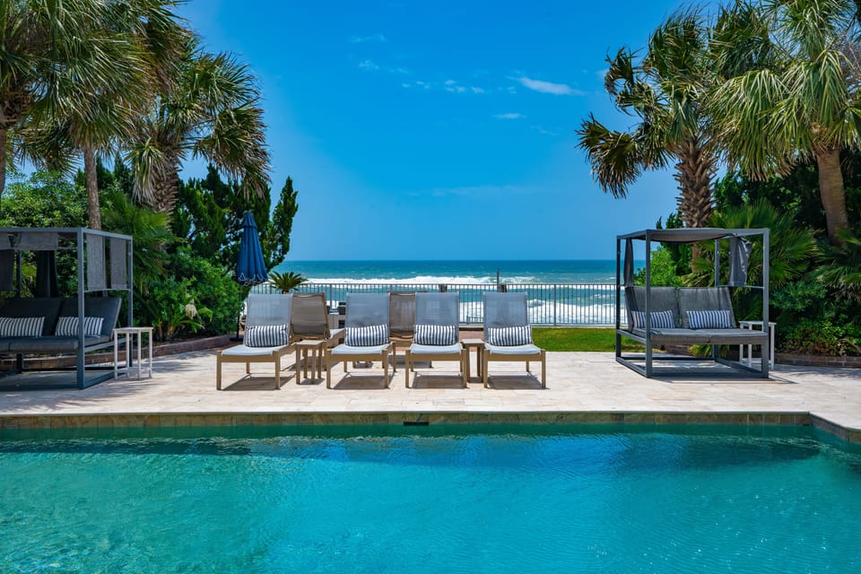 Oceanfront serenity meets poolside paradise.