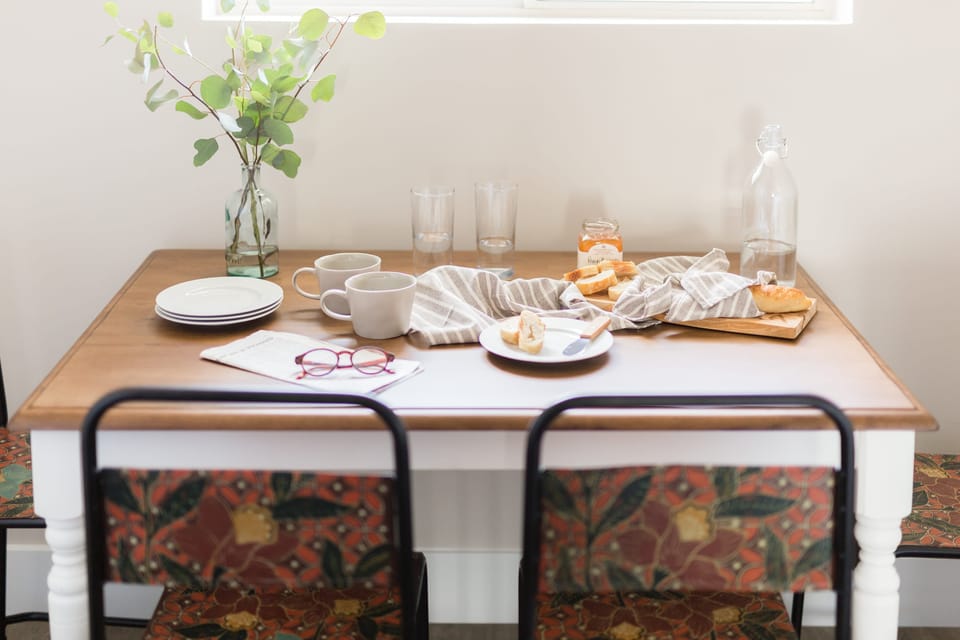 Enjoy breakfast at the dining table.