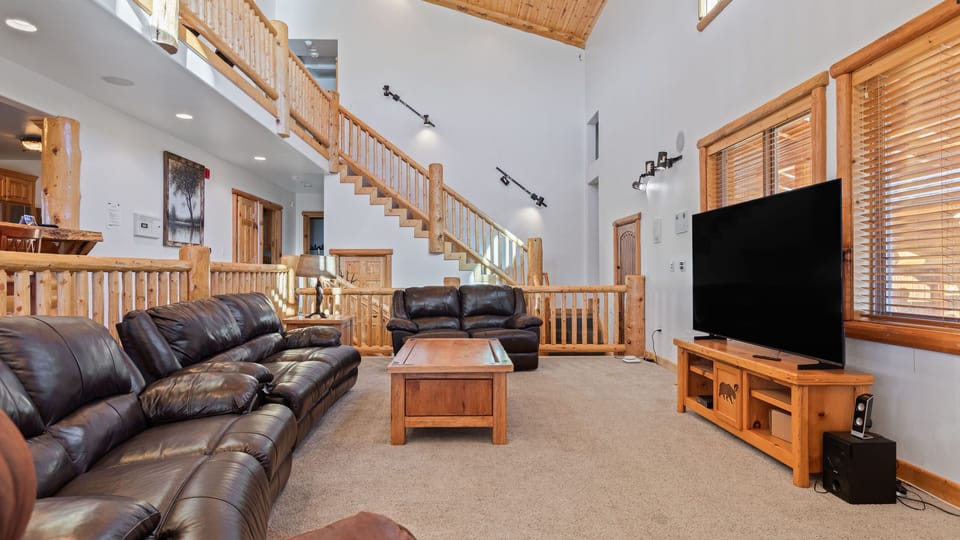 Kick back and watch a movie in the living room.