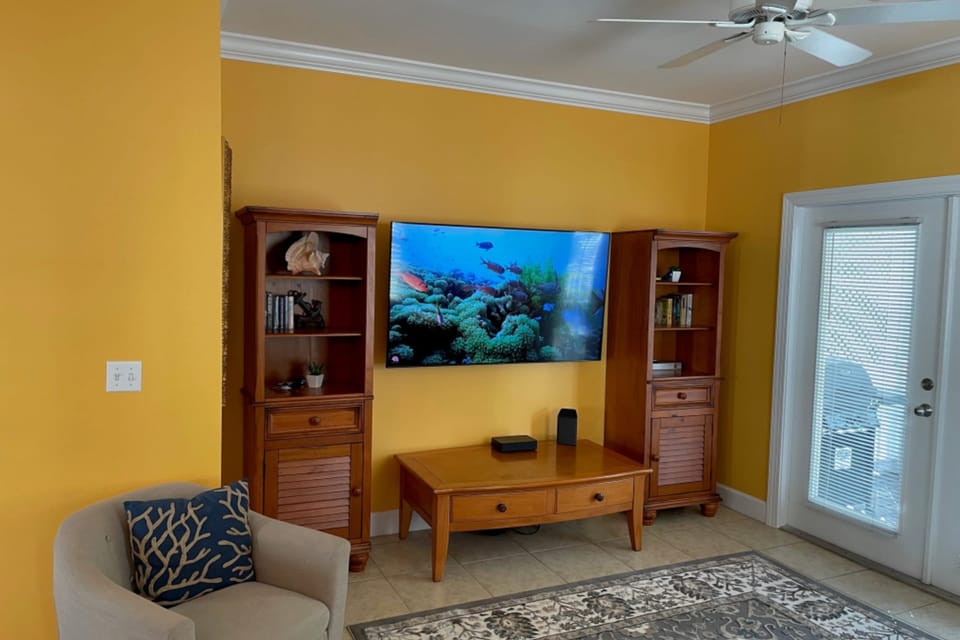 Kick back and watch a movie in the living room.